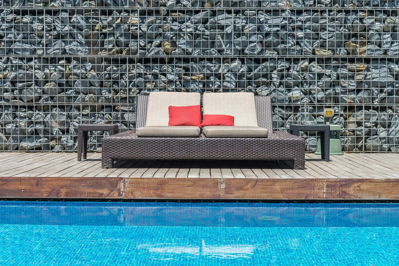 Renovated backyard pool in Pilot Point, TX with updated decking and landscape lighting