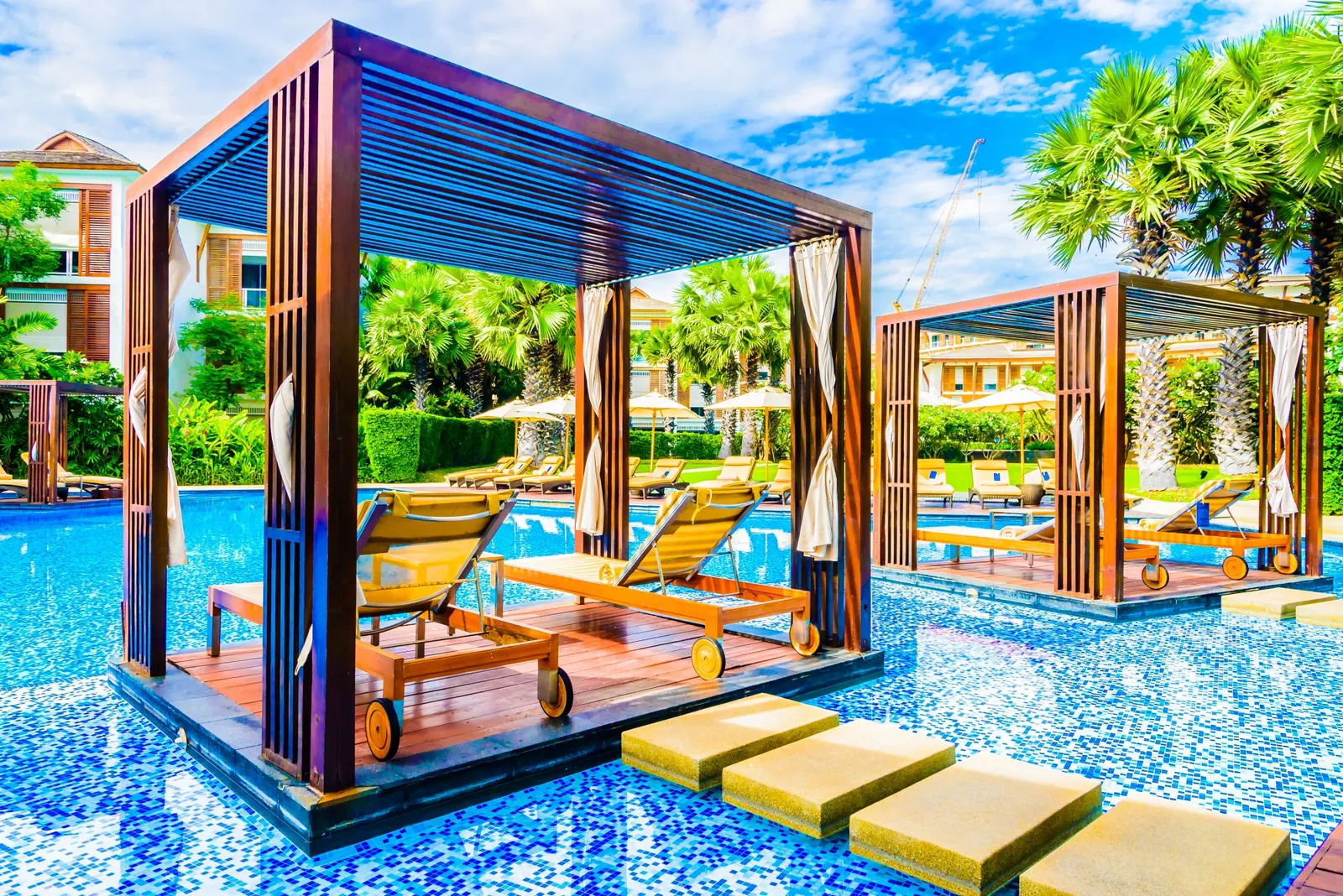 Poolside pergola over a patio in Aubrey, TX